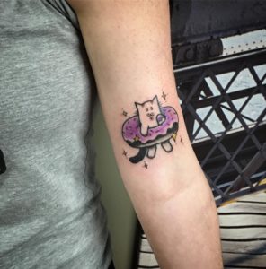 illustration style cat in a donut tattoo